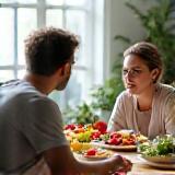 Nutrition coach consulting with a client and healthy food display.